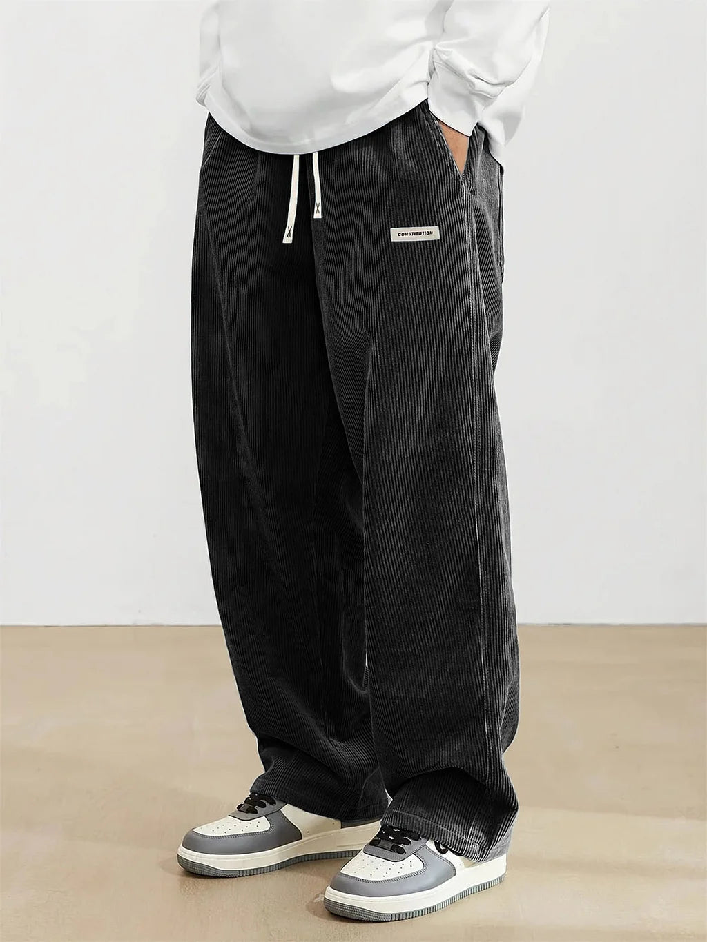 Pantalon de sport vintage en velours côtelé avec logo brodé pour homme