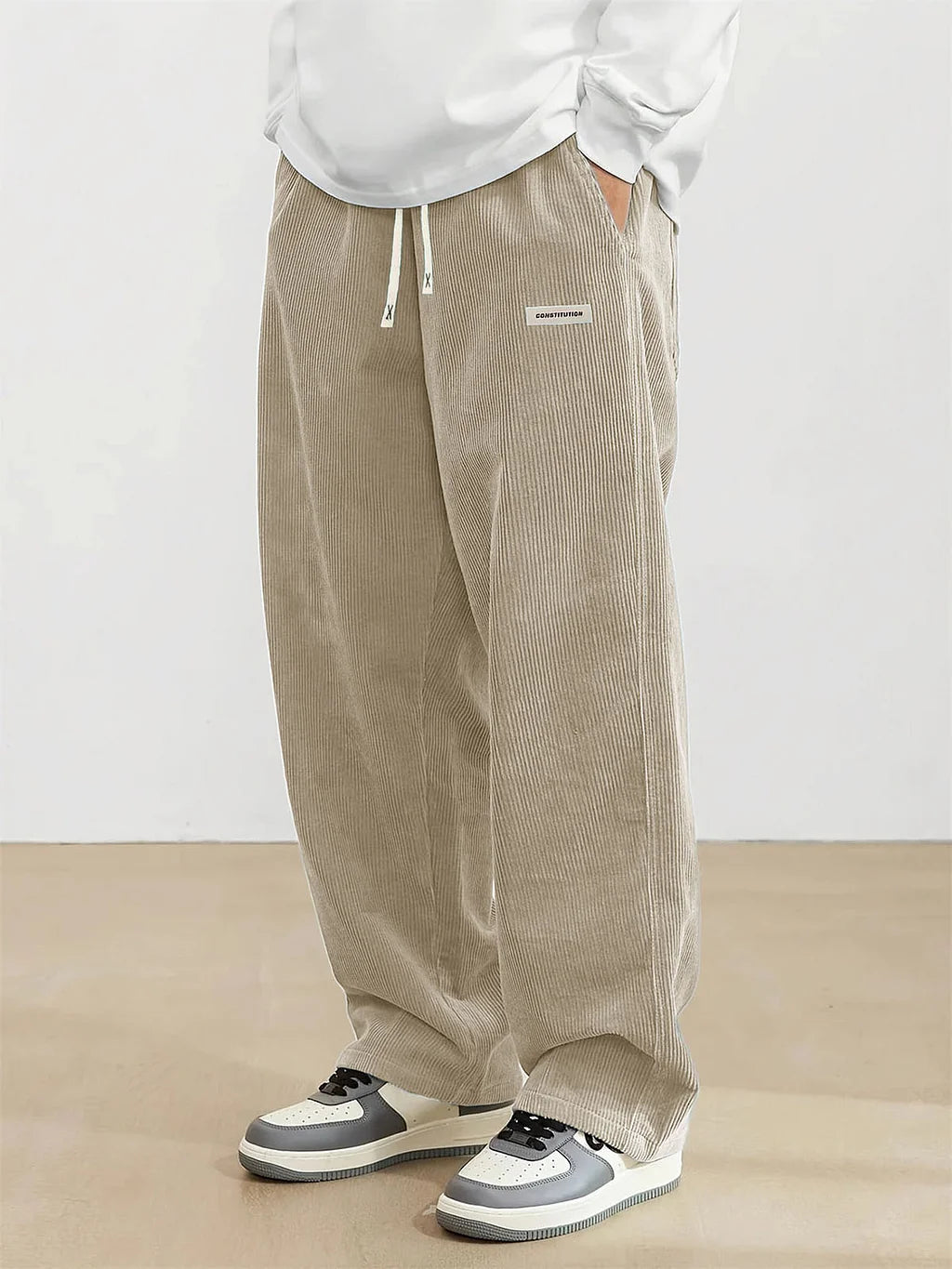 Pantalon de sport vintage en velours côtelé avec logo brodé pour homme